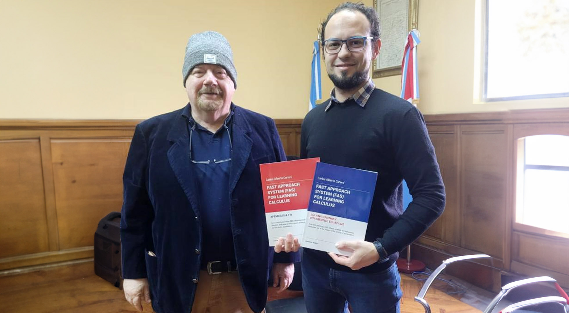 Carlos Corvini comparte conocimientos con el Decano de la Facultad de Ciencias Exactas, Ingeniería y Agrimensura